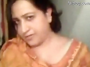 Beautiful Punjabi bhabi shows her boobs, sucks..